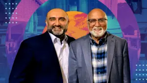 A photo of Phamily CEO Nabeel Kaukab standing next to his father.